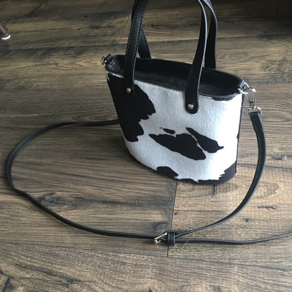 ASOS Handbags - ASOS Cow print purse 🐮